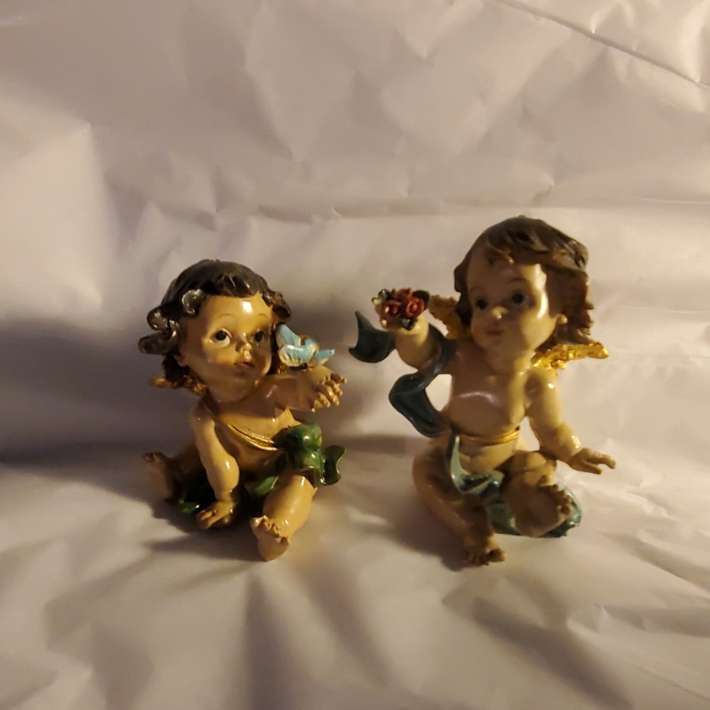 Two,  adorable little cherubs. 3 and 4 inches tall